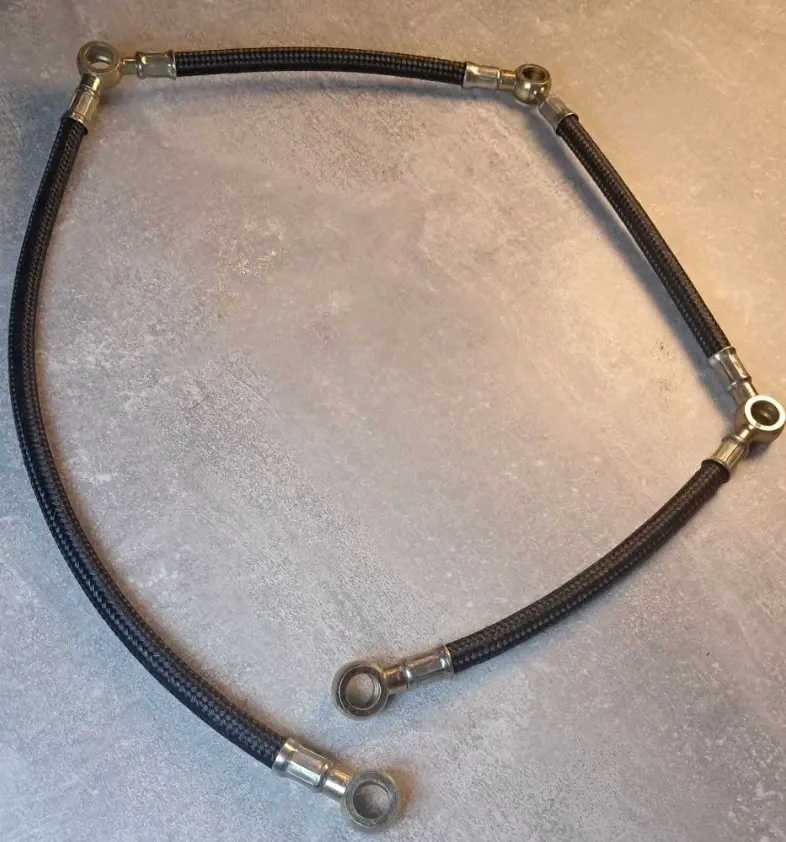 Обратка МТЗ-82/892/1025 на 4 форсунки під штуцер М8 240-1104320-А (м'яка) (вир-во Білорусь)